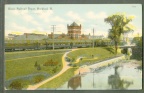 Another vintage postcard showing the train depot from the wire rope bridge on the Tinker property.